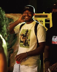 a man wearing a white t-shirt